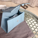 Front view of structured polished women's handbag – women's designer-style accessory