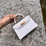 Side view of sophisticated structured handbag