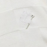 Full styled look of Louis Vuitton luxury clothing with signature branding