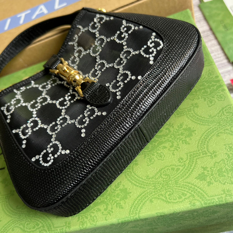 Styled lifestyle shot of sleek refined women's handbag – women's luxury handbag