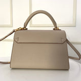 Close-up detail of statement everyday-luxe women's handbag – women's designer-style accessory