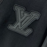 Flat lay presentation of Louis Vuitton luxury clothing with runway-inspired design