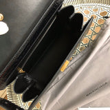 Side profile of modern refined women's handbag – women's luxury handbag