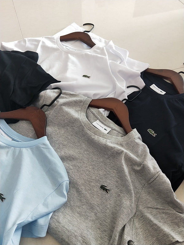 Side profile of Lacoste luxury clothing with logo-detail design