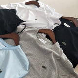 Side profile of Lacoste luxury clothing with logo-detail design
