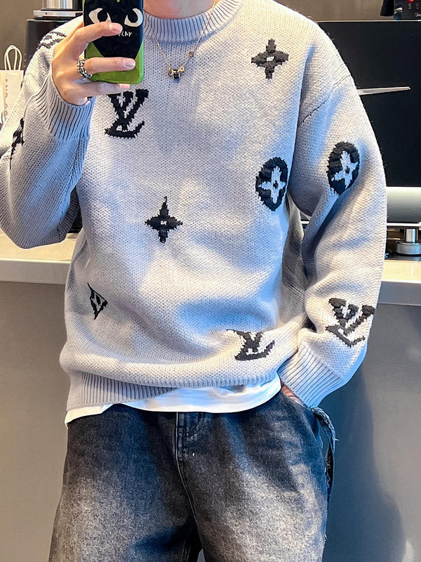 Flat lay presentation of Louis Vuitton luxury clothing with monogram-inspired silhouette