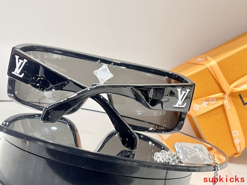 Close-up detail view of Louis Vuitton unisex sunglasses