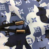 Flat lay presentation of Louis Vuitton cotton t-shirt with runway-inspired design