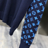 Flat lay presentation of Louis Vuitton luxury clothing with tailored silhouette