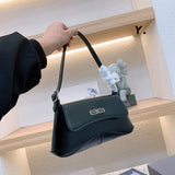 Ziva's Charm handbag – carry view (one versatile size)