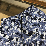 Close-up detail shot of Louis Vuitton cotton t-shirt with runway-inspired design