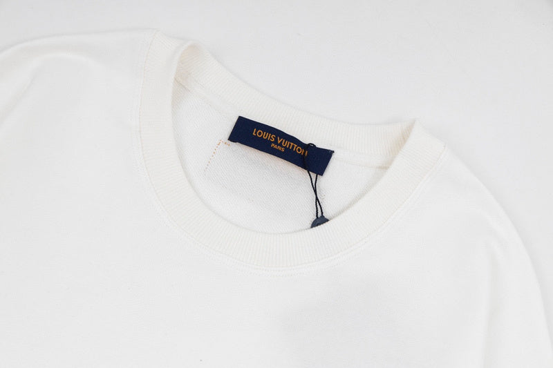 Front view of Louis Vuitton luxury clothing with label-forward styling