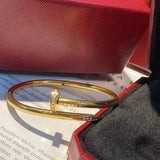 Front view of Cartier unisex jewelry piece