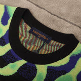 Front view of Louis Vuitton luxury clothing with logo-detail design