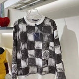 Full styled look of Louis Vuitton luxury clothing with streetwear-inspired cut