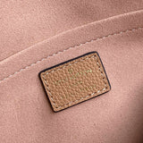 Side profile of refined structured women's handbag – women's luxury accessory