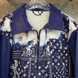 Flat lay presentation of Louis Vuitton luxury clothing with contemporary cut