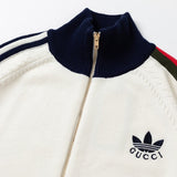 Close-up detail shot of Gucci luxury clothing with logo-detail design