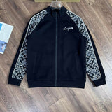 Front view of Louis Vuitton luxury clothing with label-forward styling