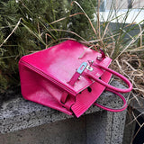 Understated bag shown from front angle