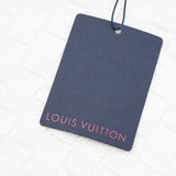 Flat lay presentation of Louis Vuitton luxury clothing with everyday silhouette