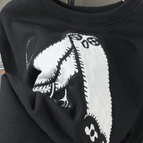 Front view of Louis Vuitton luxury clothing with streetwear-inspired cut