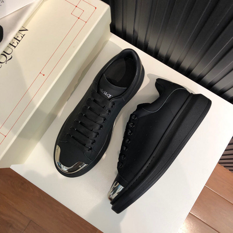 Nike Luxury sneakers in tonal black premium leather build front view