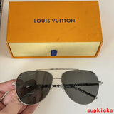 Lifestyle view of Louis Vuitton unisex sunglasses