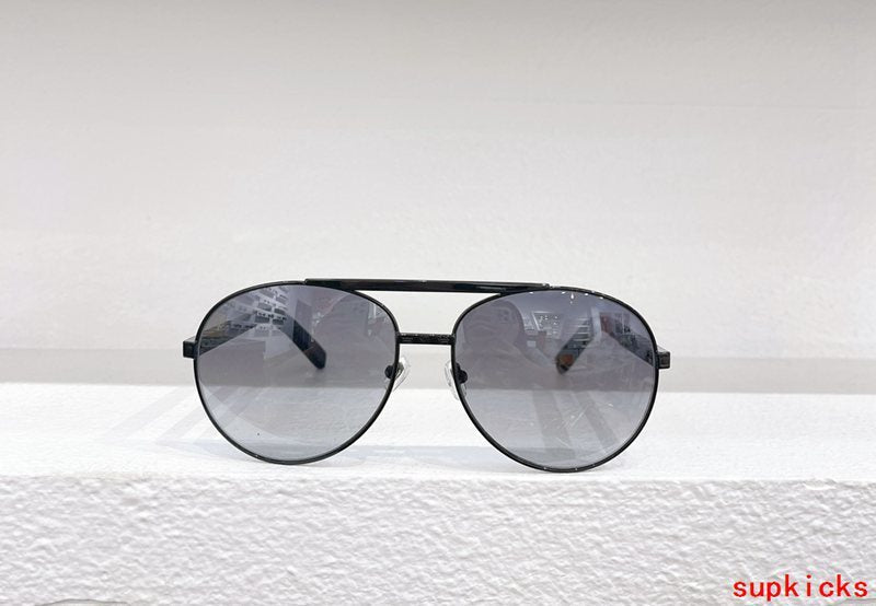 Close-up detail view of Louis Vuitton unisex sunglasses