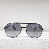 Close-up detail view of Louis Vuitton unisex sunglasses