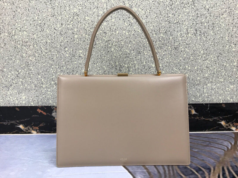 Close-up detail of refined modern women's handbag – women's designer-style accessory