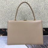 Close-up detail of refined modern women's handbag – women's designer-style accessory