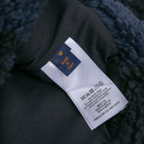 Back view of Louis Vuitton luxury clothing with relaxed-fit cut