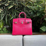 Close-up detail of poised bag design