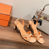 Hermes shoes Style 305 - close-up of classic monogram styling