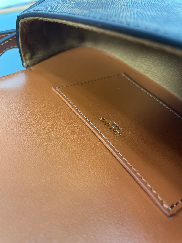 Close-up detail of sleek everyday-luxe women's handbag – women's premium purse