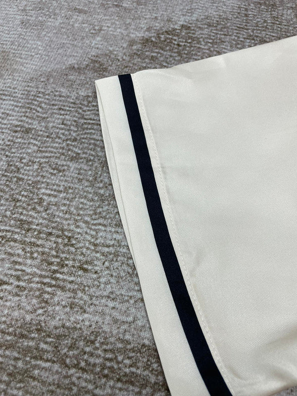 Texture and finish detail of Amiri luxury piece style No.104
