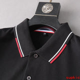 Close-up detail shot of Moncler luxury clothing with monogram-inspired silhouette