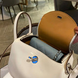  streamlined everyday bag styled with outfit
