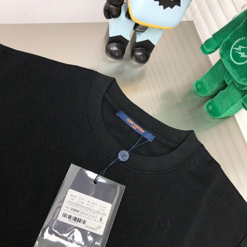 Side profile of Louis Vuitton cotton t-shirt with label-forward styling