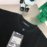 Side profile of Louis Vuitton cotton t-shirt with label-forward styling