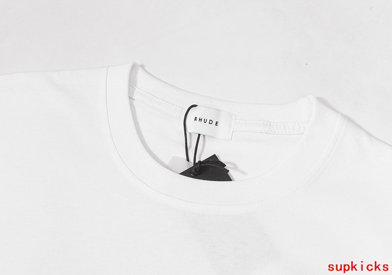 Flat lay presentation of Rhude luxury clothing with runway-inspired design
