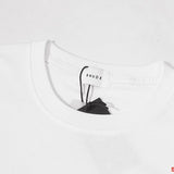 Flat lay presentation of Rhude luxury clothing with runway-inspired design