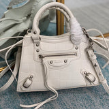 Understated Premium PU Leather Handbag - Statement Silhouette | Women's Premium Handbag #665 - side angle view (image 2) of designer-inspired handbag
