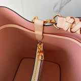 Front view of modern chic women's handbag – women's statement bag