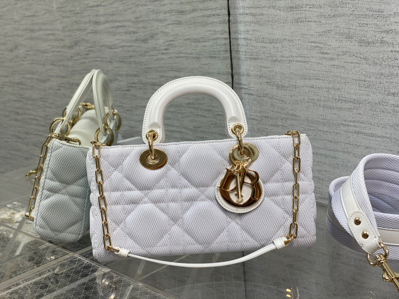 Front view of premium chic women's handbag – women's statement bag