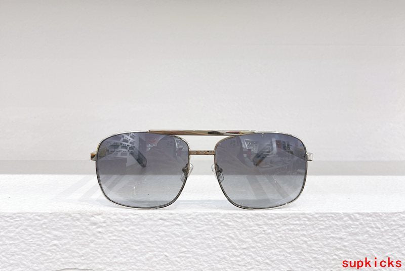 Close-up detail view of Louis Vuitton unisex sunglasses