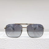 Close-up detail view of Louis Vuitton unisex sunglasses