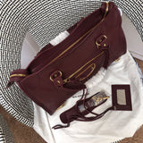 Handle and strap detail of sleek everyday-luxe women's handbag – women's premium purse