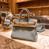  Sophisticated top-handle bag front view